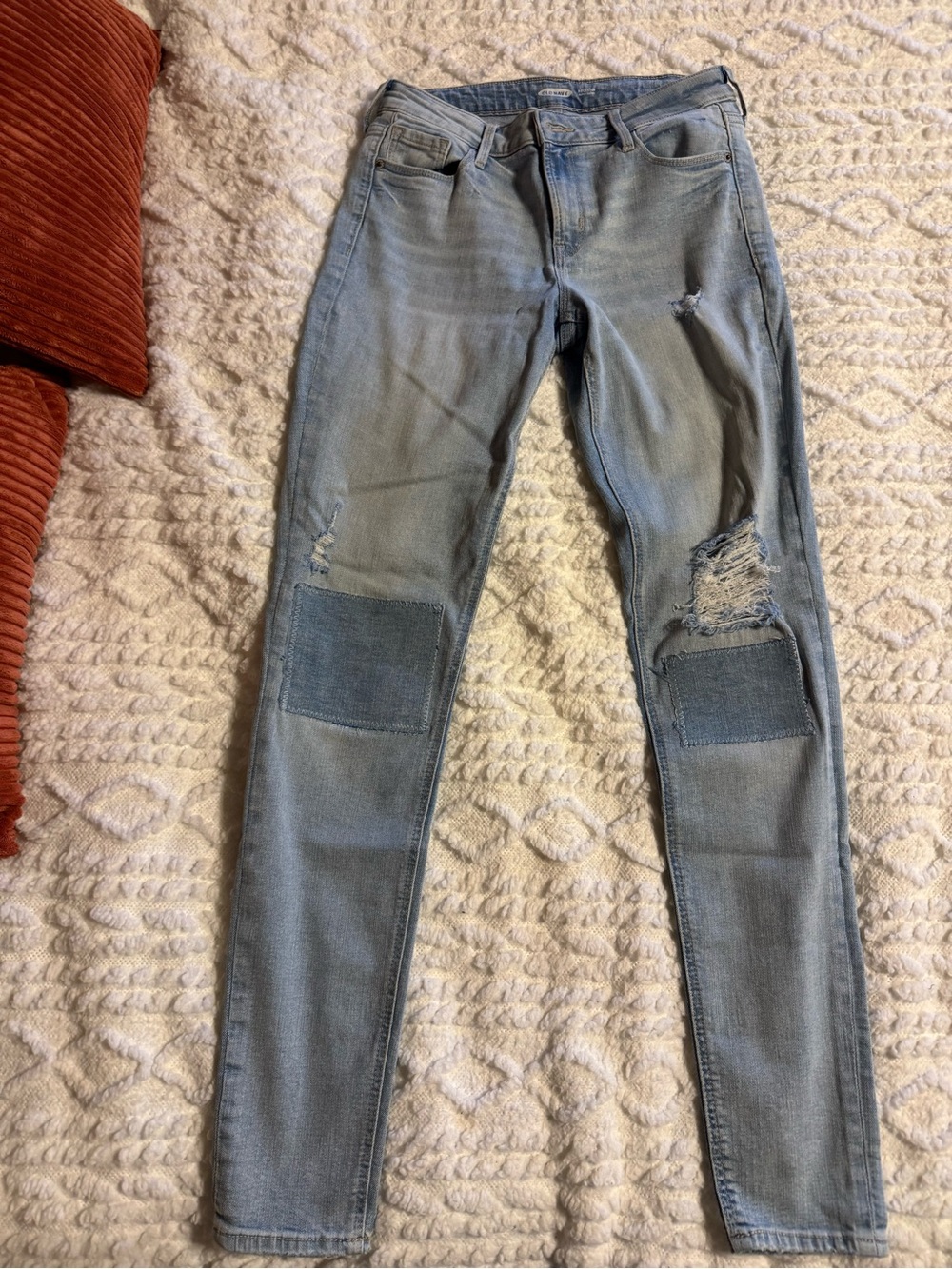 Old navy women’s size 4 Tall light wash ripped design with patch detailing